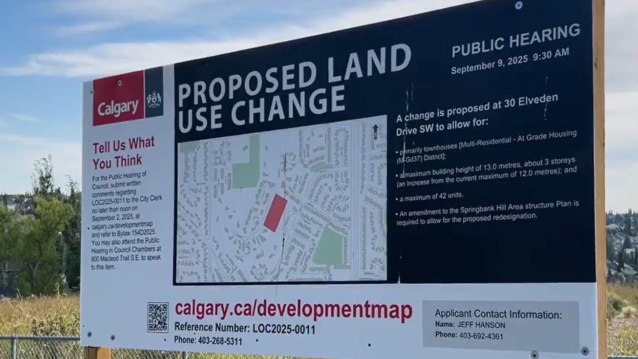 A sign at 30 Elveden Drive SW, the potential location of a new housing development Springbank Hill in southwest Calgary.