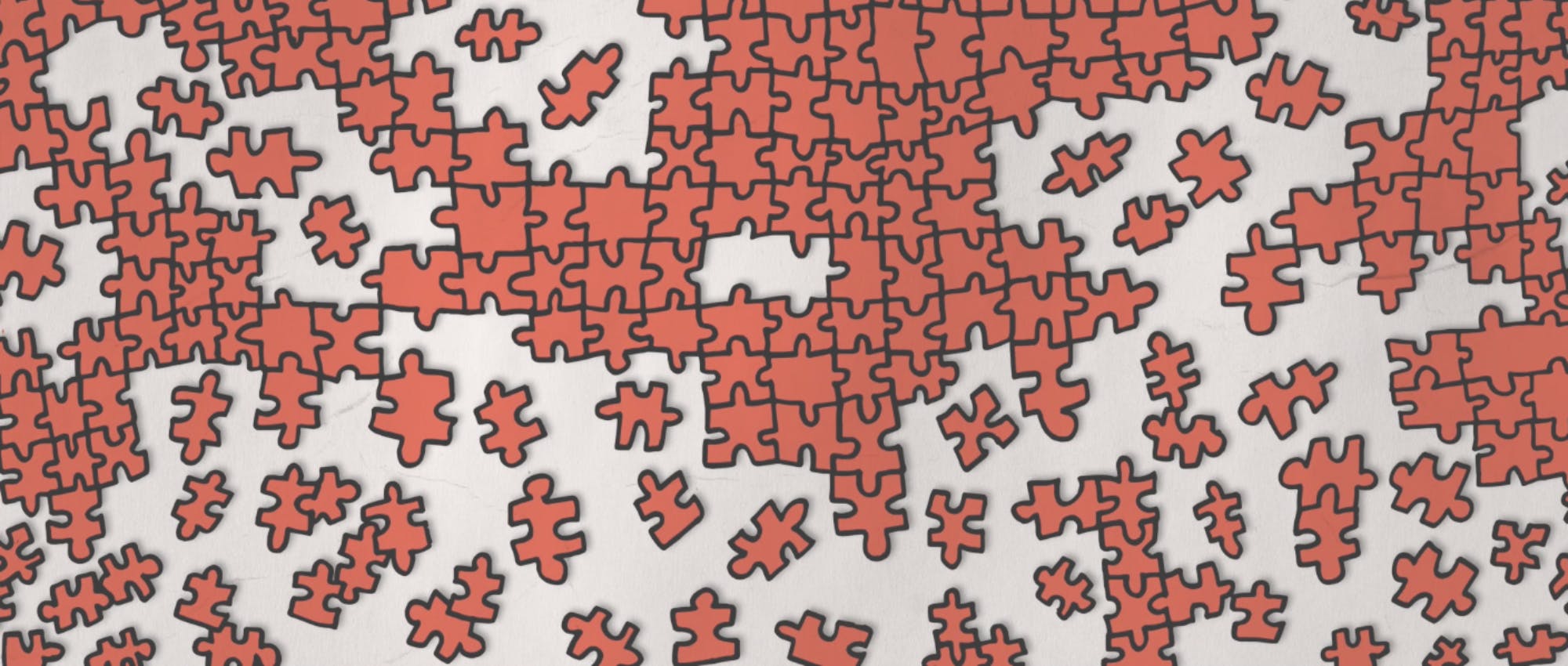Red puzzle pieces scattered across a white background. They are in cartoon style and most of the pieces are connected.