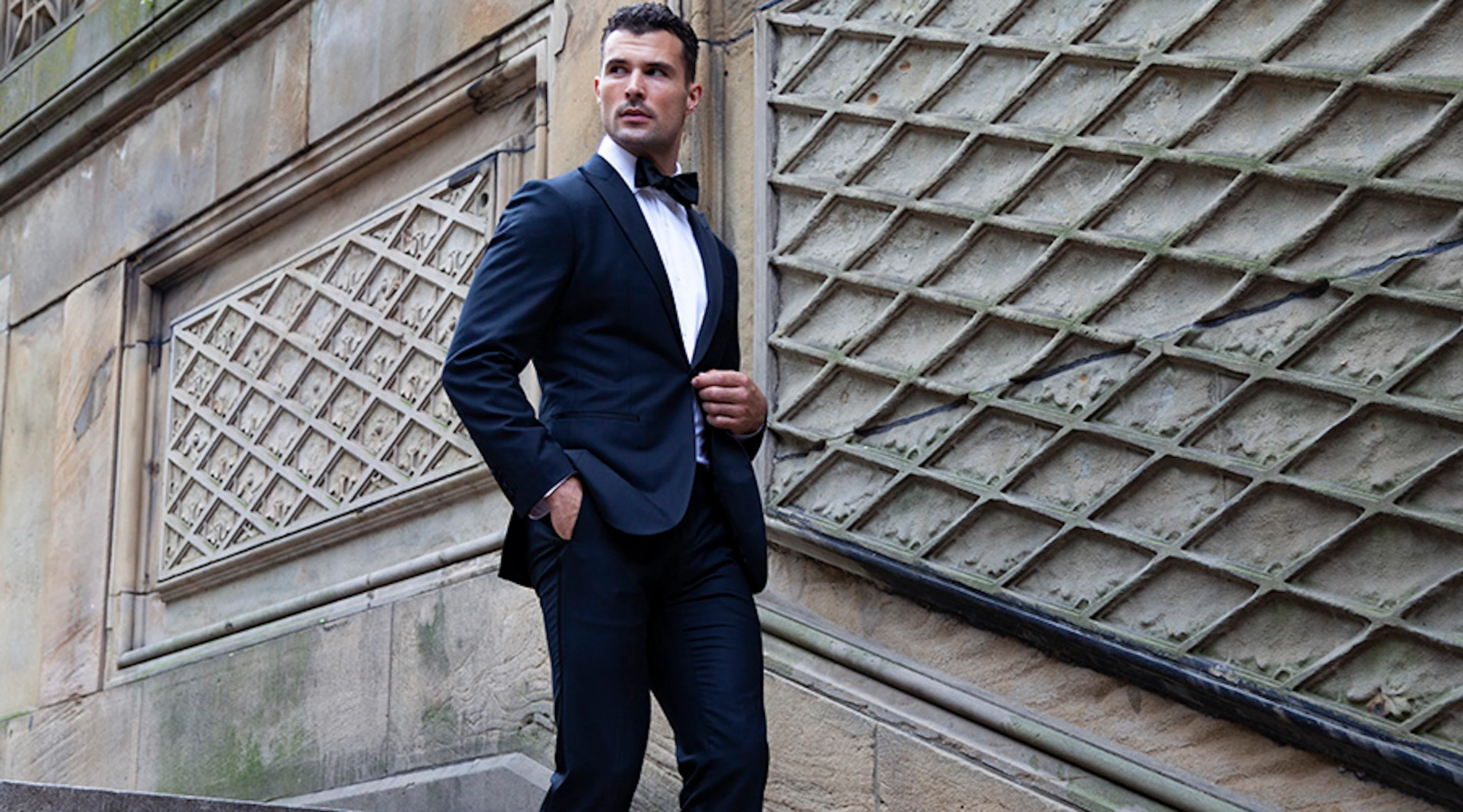 Man in tuxedo on stairs in central park new york