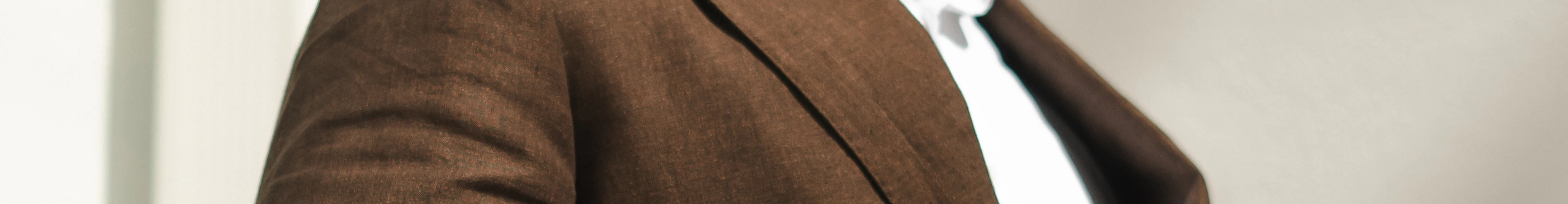 Enzo Sartori vs. Loro Piana: A Comparative Guide to Luxurious Fabric Choices