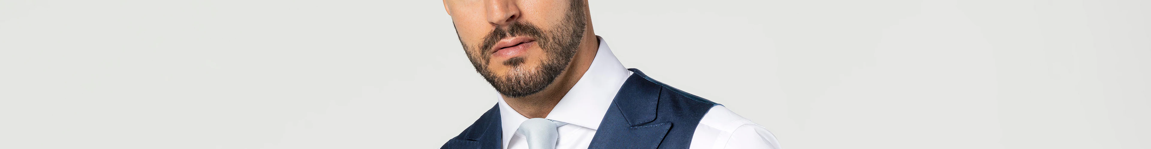 The Art and Allure of Custom Men's Suit Vests at Enzo Custom