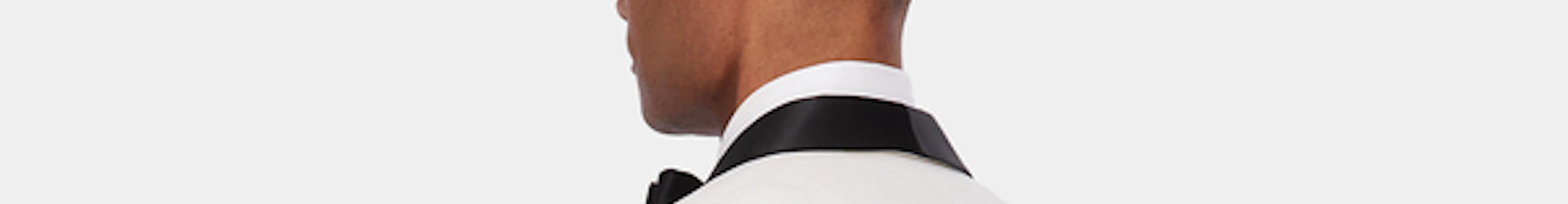 The Elegance of Under Collar Monograms in Tuxedos