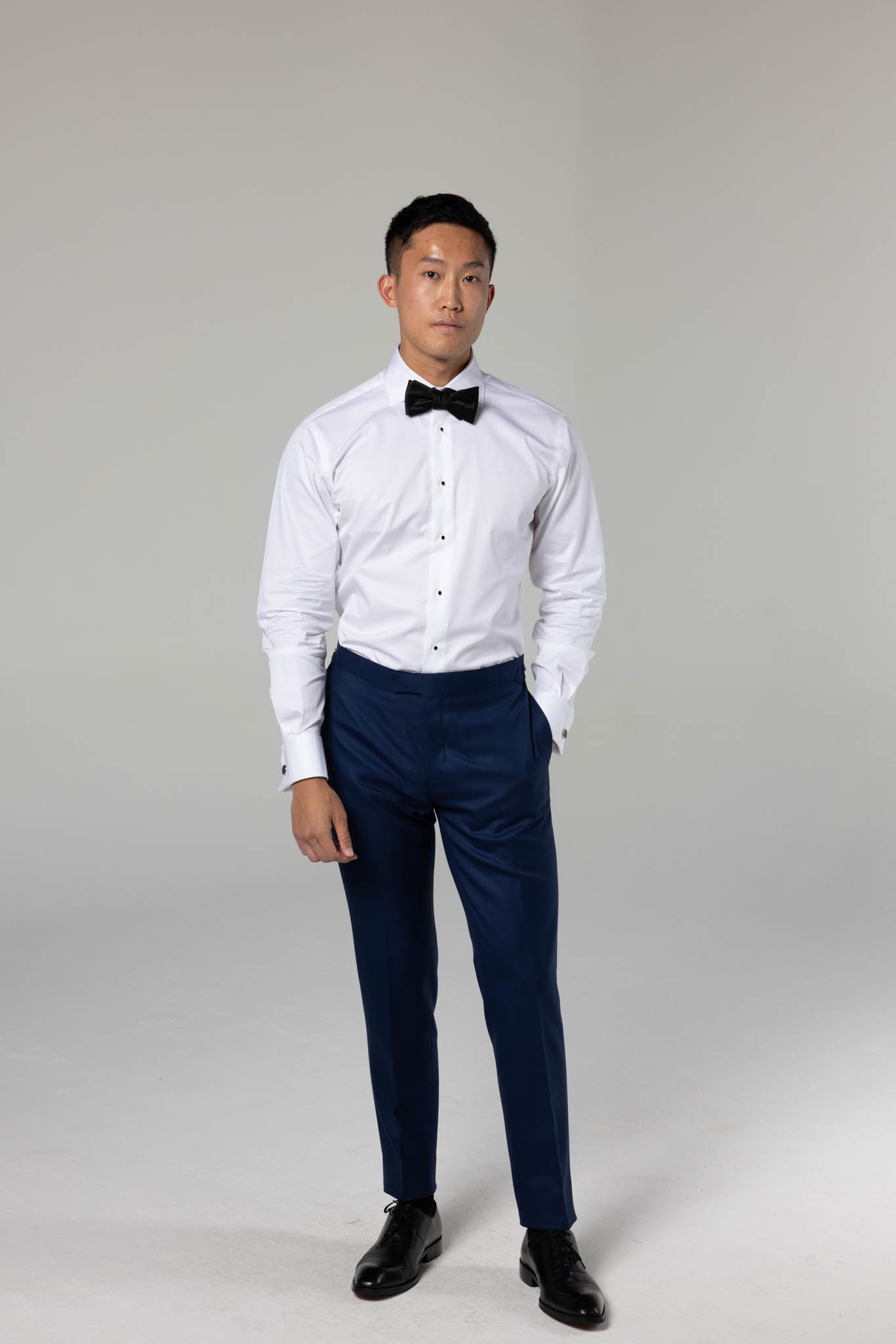 Dressed to Impress: The Battle of Elegance - Navy vs. All Black Tuxedo