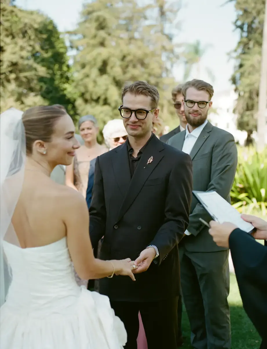 Owen at the altar, exchanging vows with Alexa