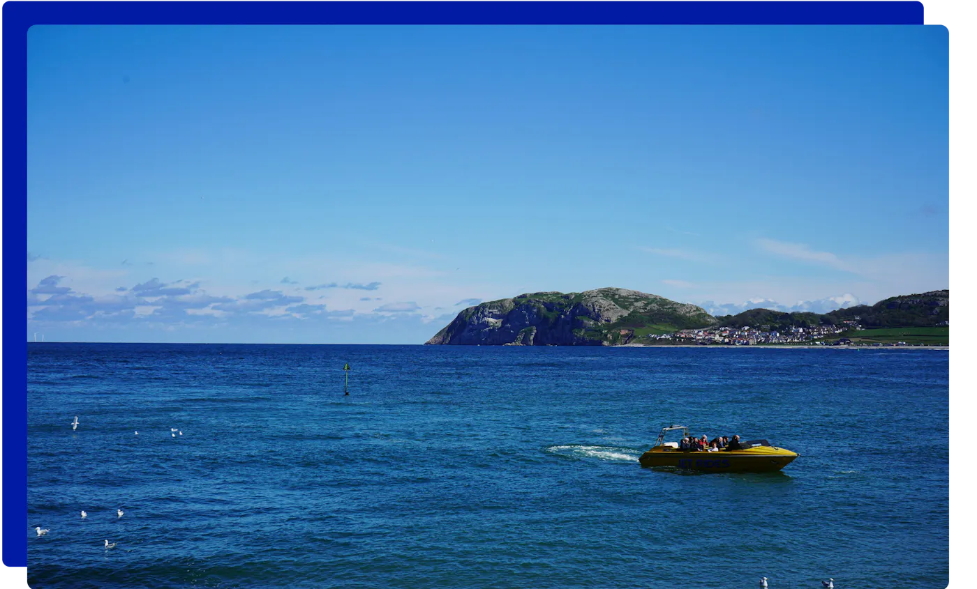 Boat trip on the sea off Llandudno, with the Little Orme behind
