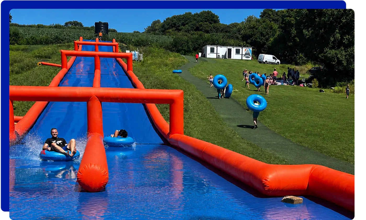Family at Avalanche Slip and Slide at East Crinnis Holiday Park