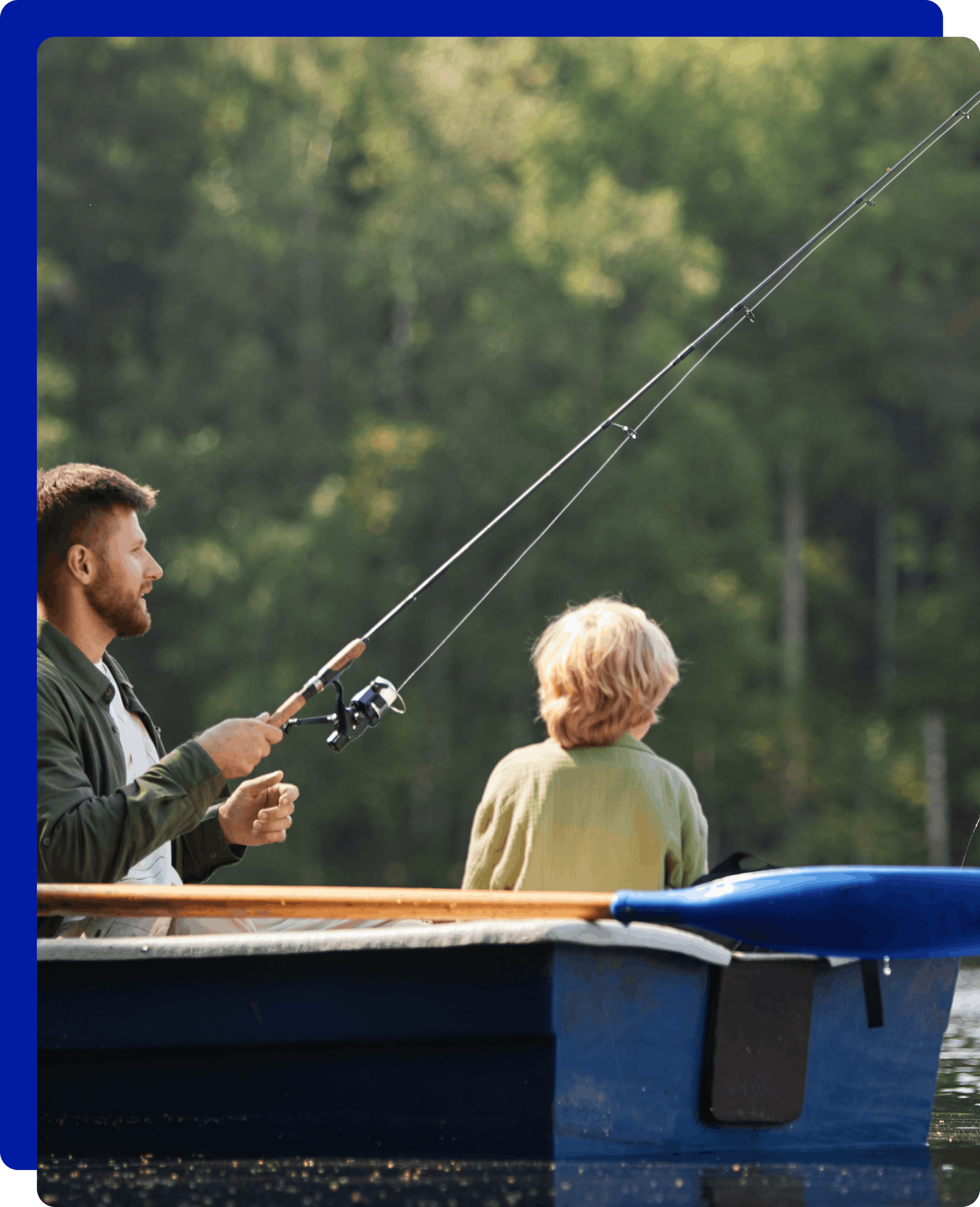 Father and son fishing on a lake