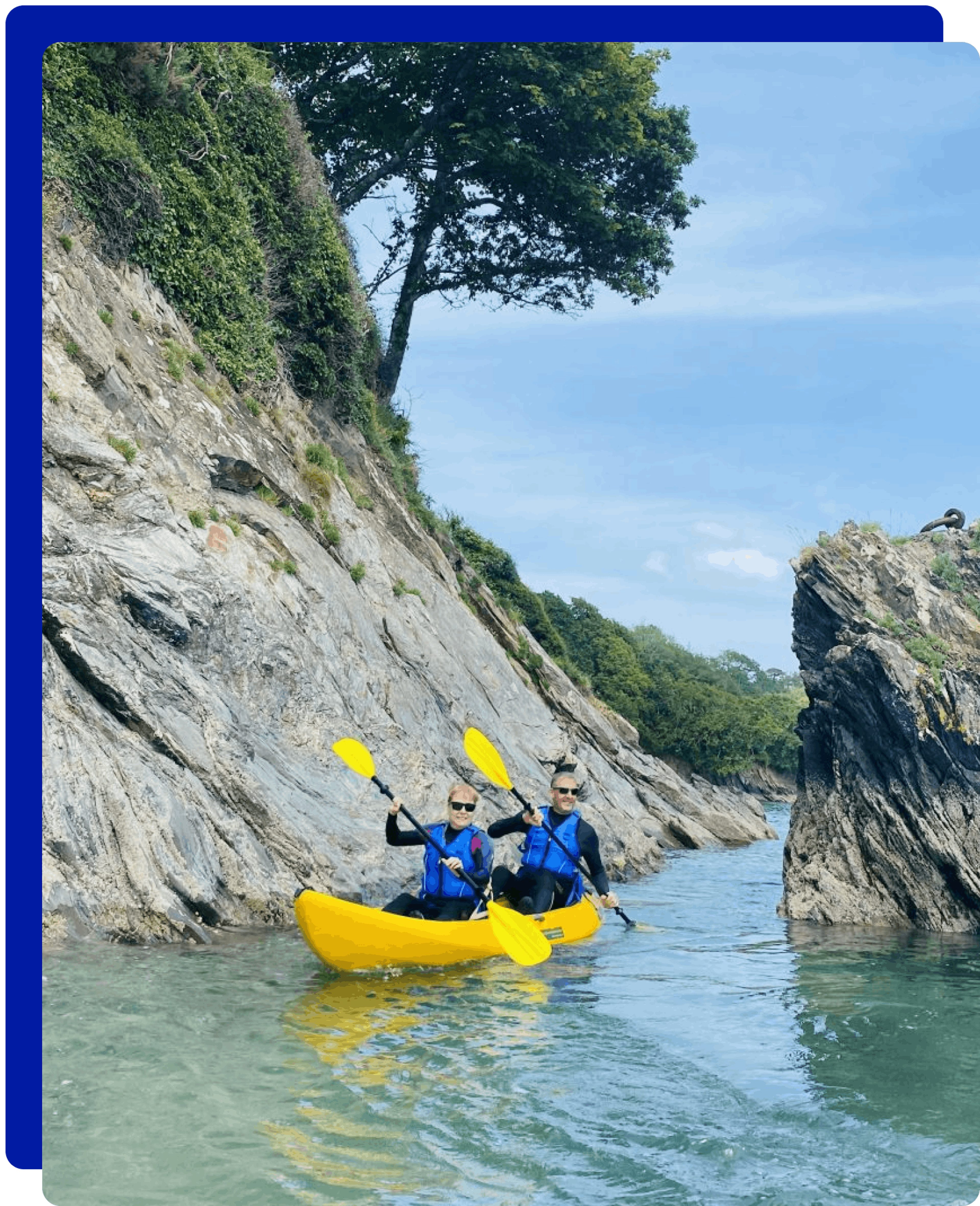 Couple kayaking in Cornwall