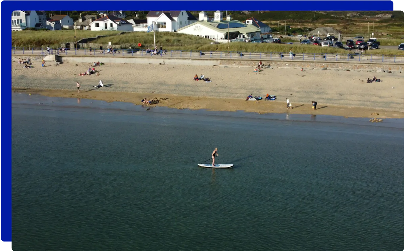 Paddleboarder in Trearddur Bay, Anglesey