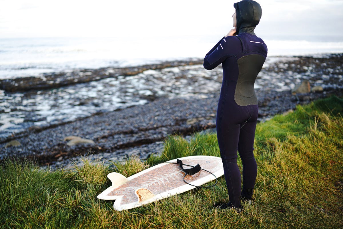 surfer observing surf