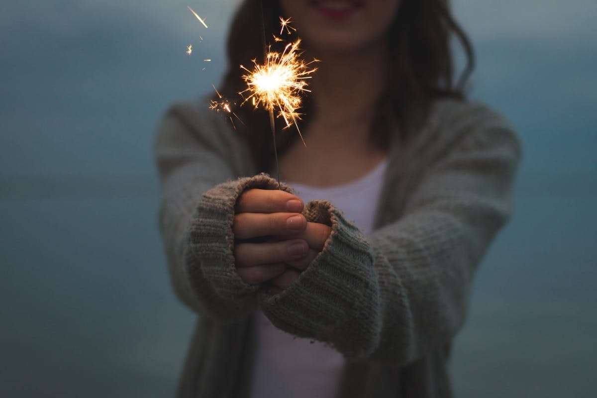 women with a sparkler