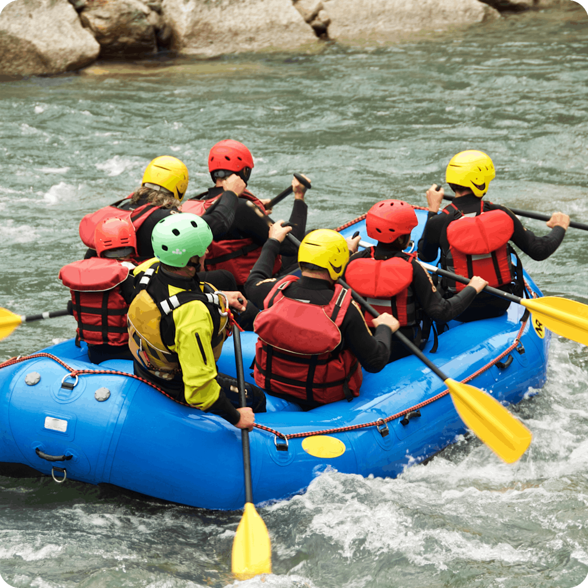 Group white water rafting in artificial river