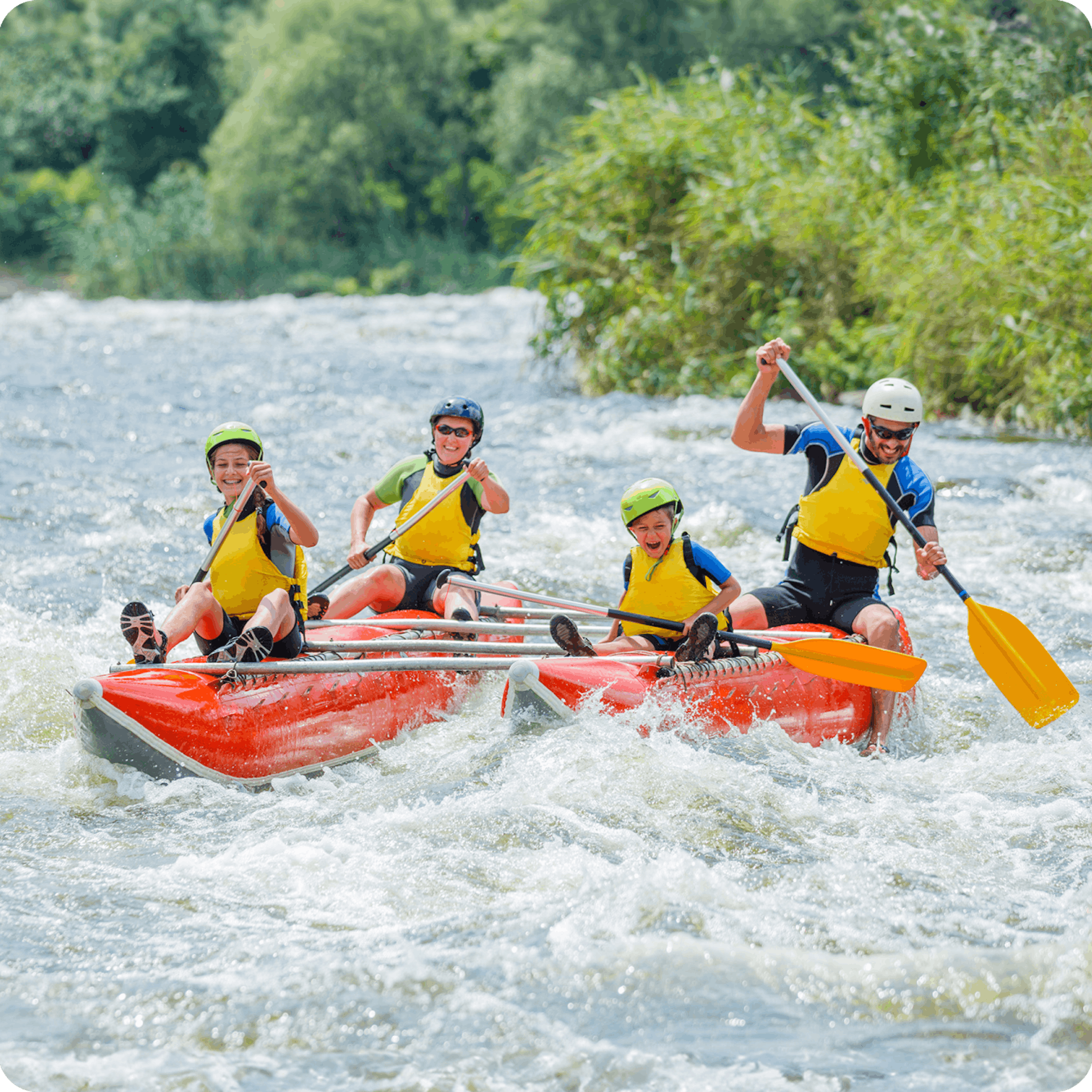 Group white water rafting in Wales