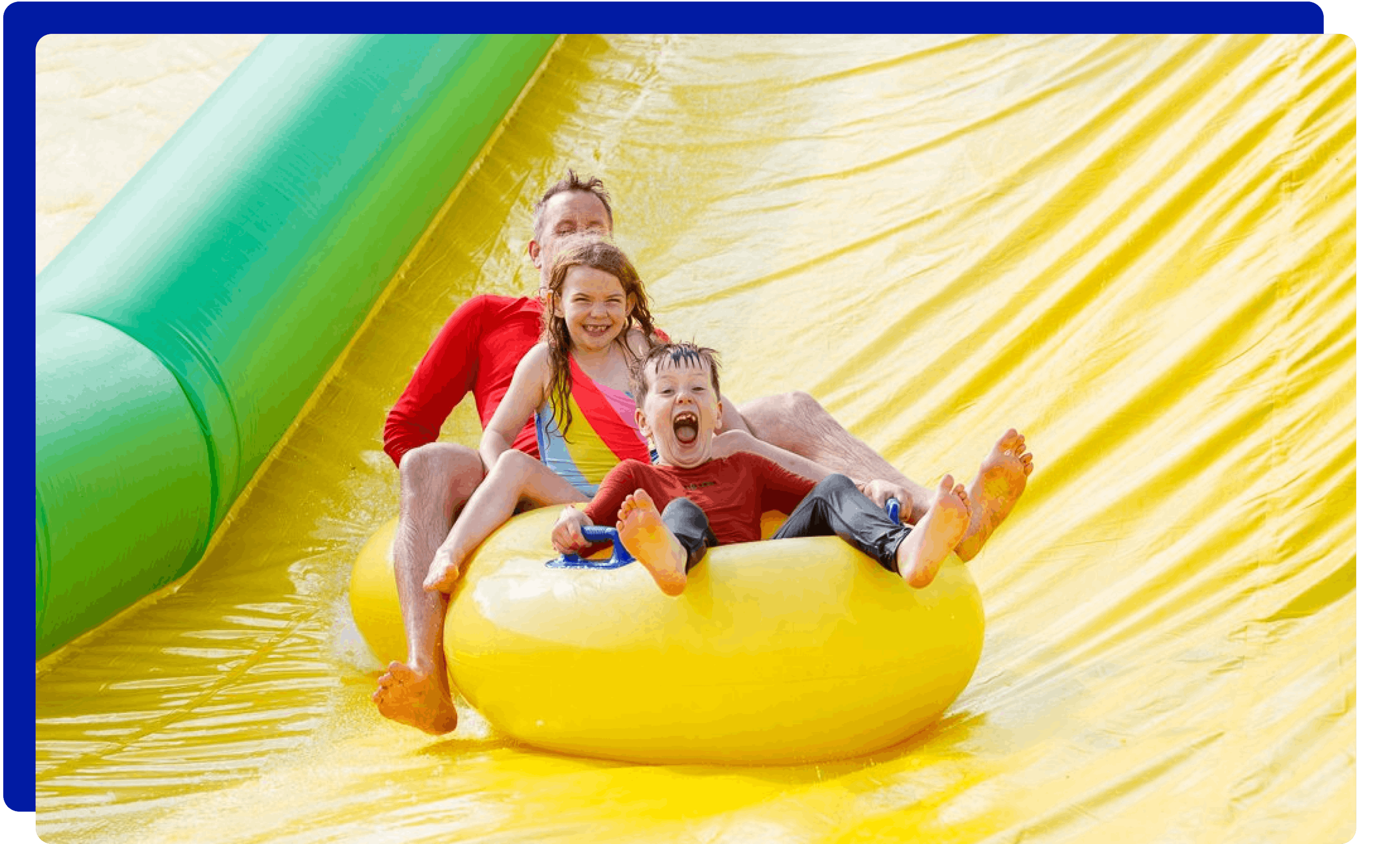 Family slip and sliding in Somerset at Ultimate Slip n Slide