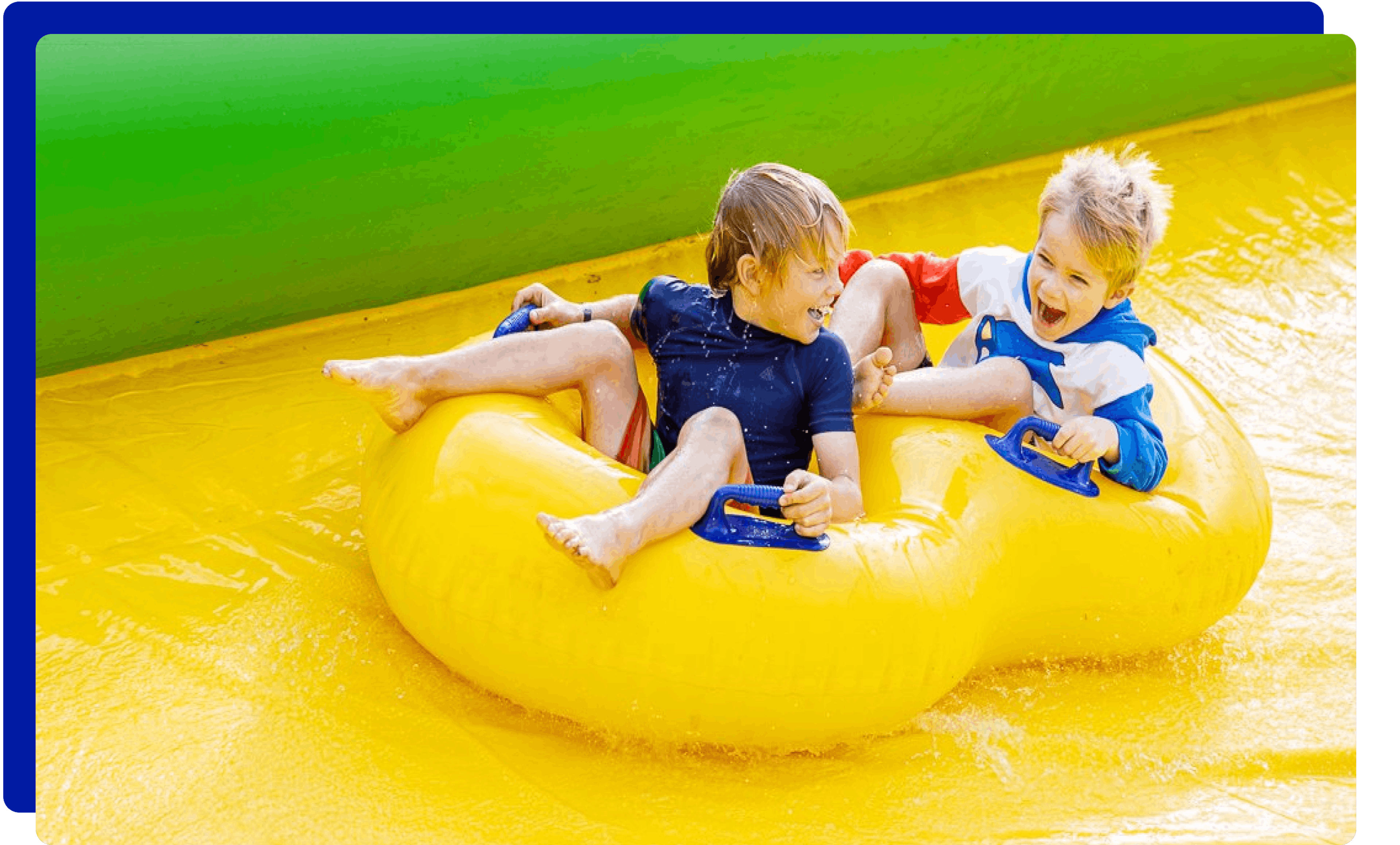 Children enjoying the Ultimate Slip n Slide in Somerset