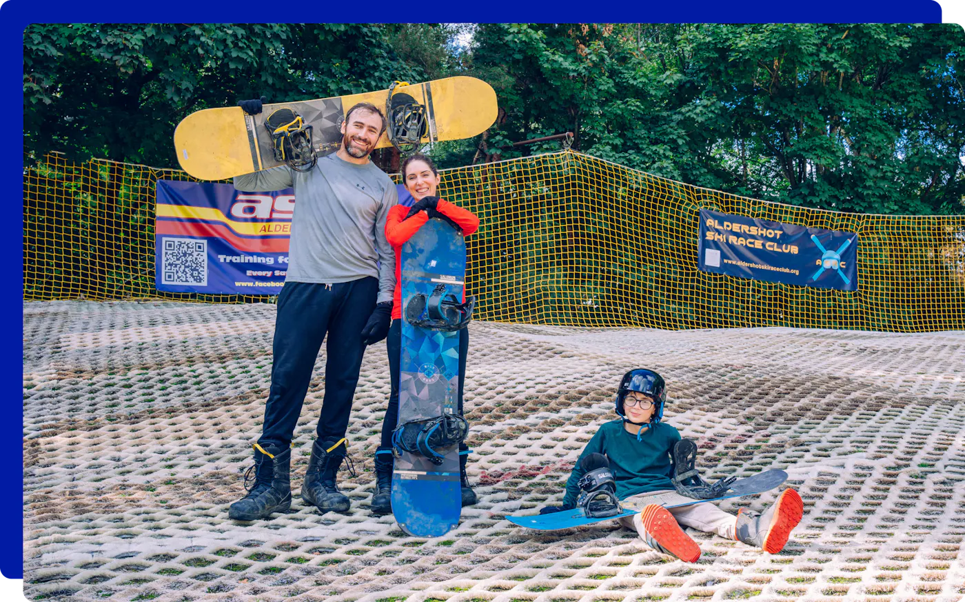 Family snowboarding and skiing near London