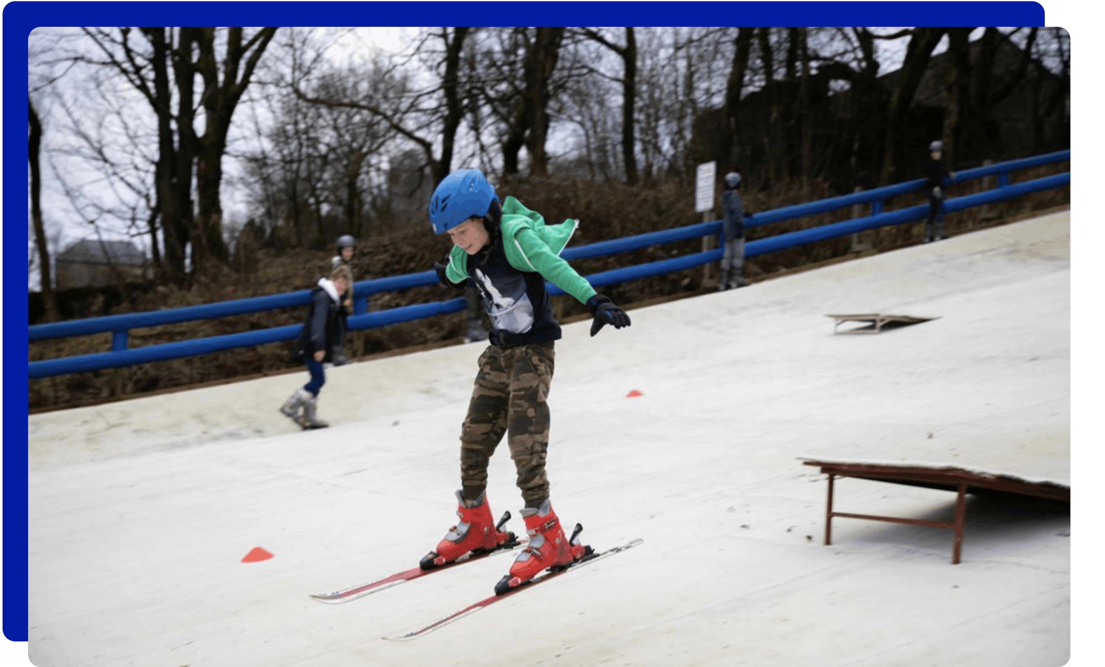Boy skiing down the ski slopes at The Hill, Ski Rossendale in Lancashire