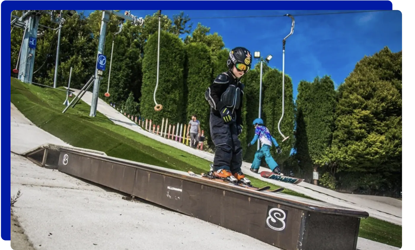 Child snowboarding in Cardiff