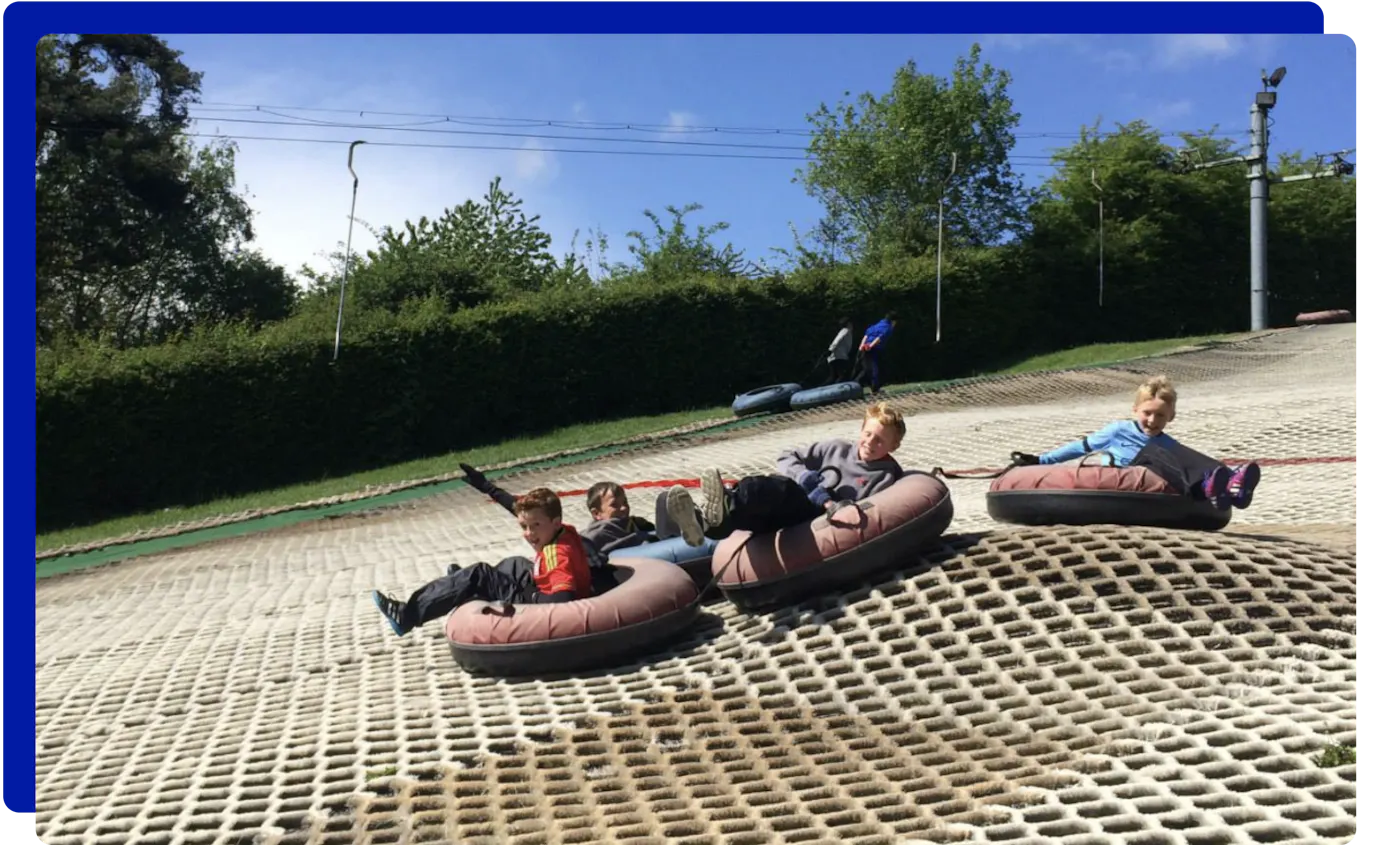 Children tubing at Cardiff Ski & Snowboard Centre in Cardiff