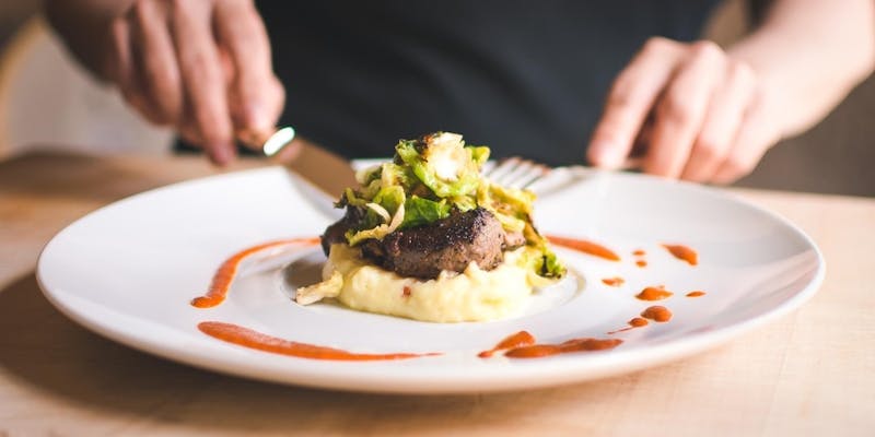 private chef steak dinner with mashed potatoes and brussel sprouts