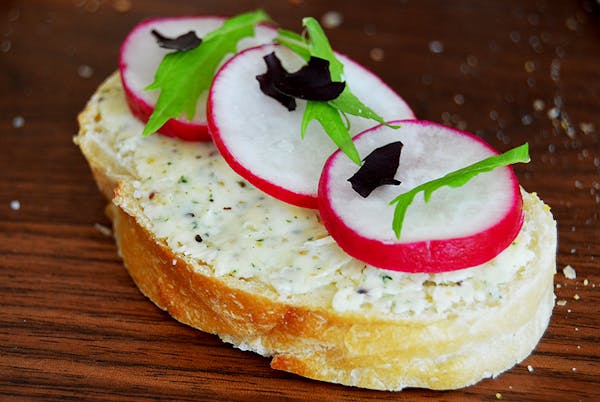 Sliced Radishes on a Baguette with Butter