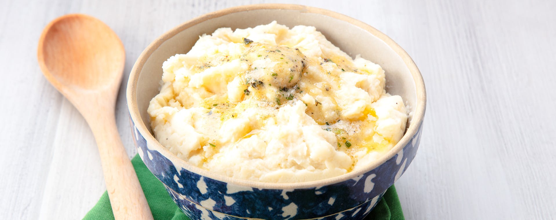 Mashed Potatoes with Roasted Garlic Herb flavored butter