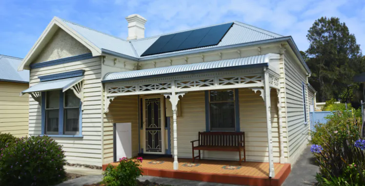 Home with solar panels & Tesla battery