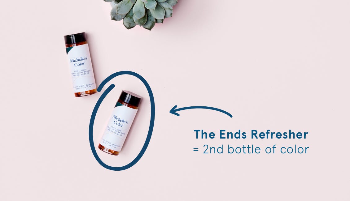 Image of two bottles of custom hair color on pink background one of the bottles is for roots and the other is esalons custom ends refresher