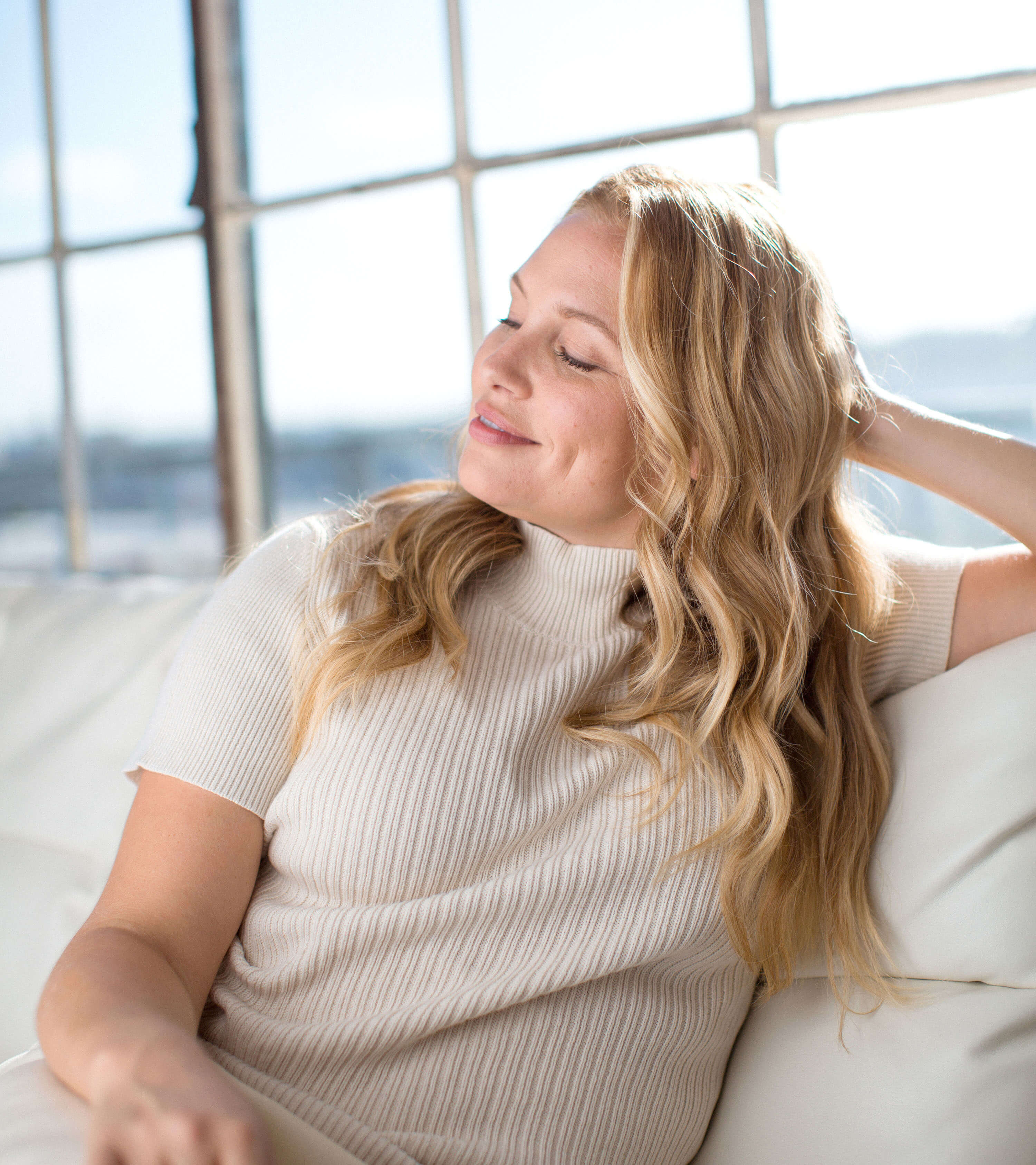 Image of woman with beautiful blonde custom hair color