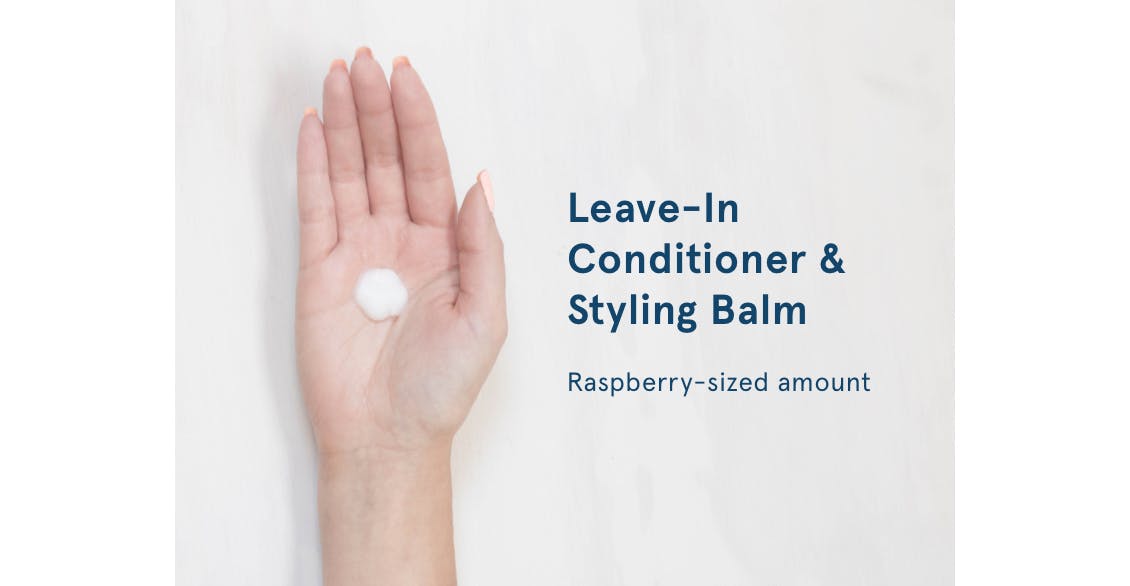 Image of hand with raspberry-sized amount of leave-in conditioner or styling balm to show the proper amount to use in hair