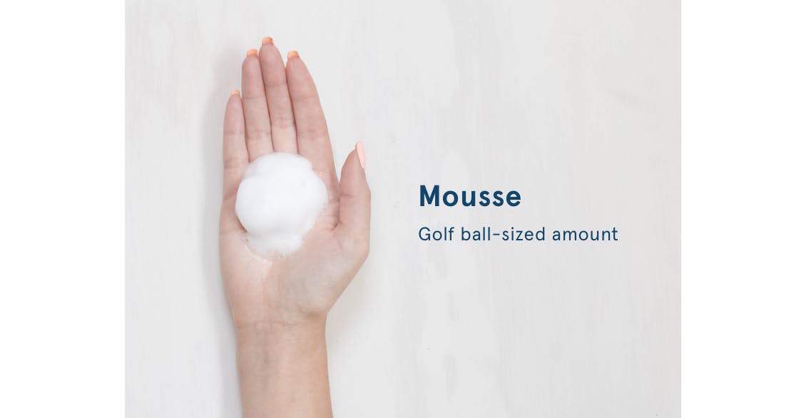 Image of hand with a golf ball-sized amount of mousse to show the proper amount to use in hair