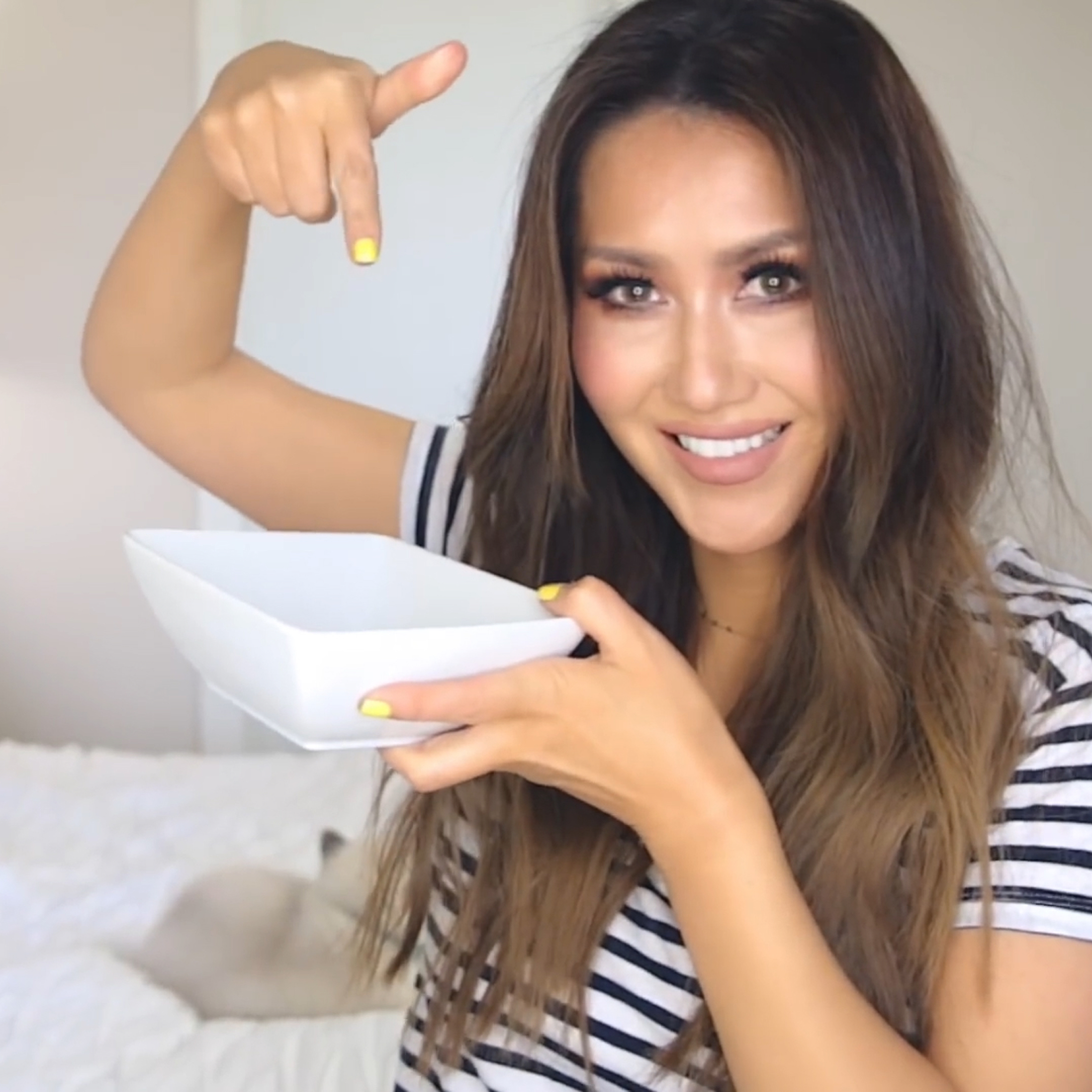 Image of Tina Lee from Makeup Wearables creating a balayage look with eSalon hair color. 