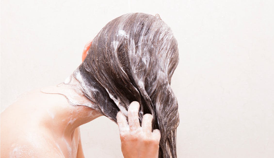 Washing your hair with cooler water can help save your color and keep it vibrant. 