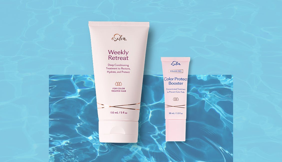 Bottle of weekly retreat and color pro booster treatment against a water background.