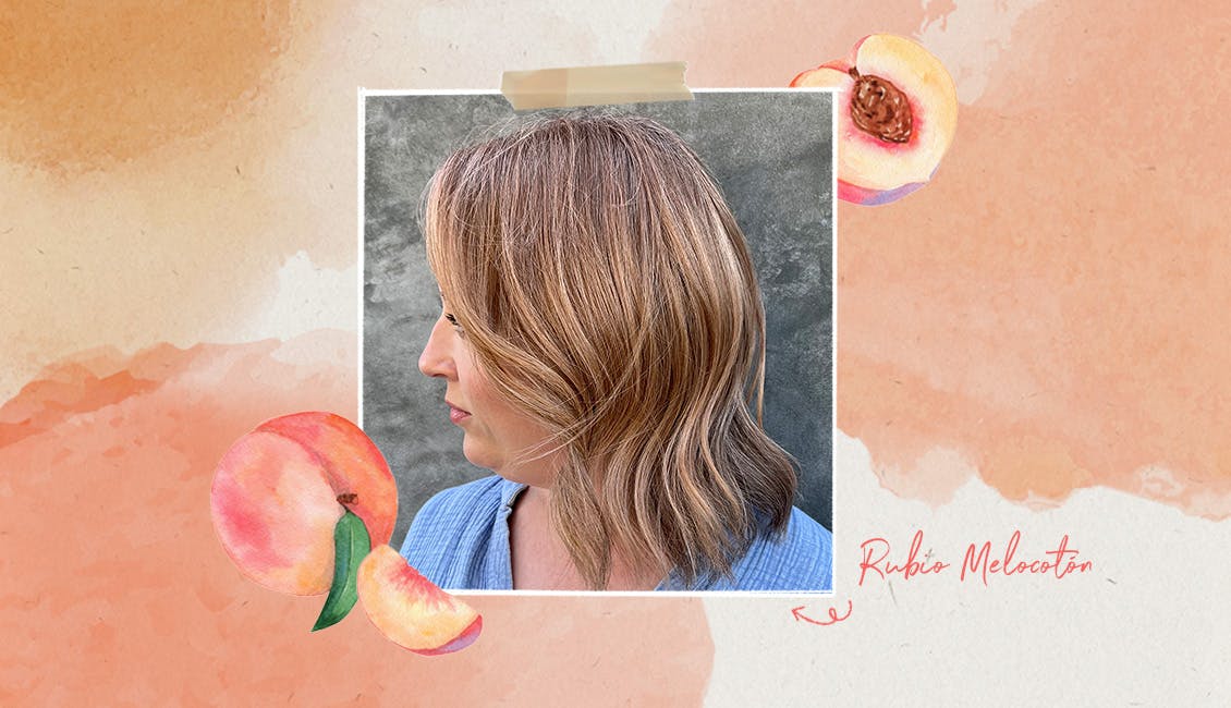 Image of woman with strawberry blonde hair looking away from the camera.