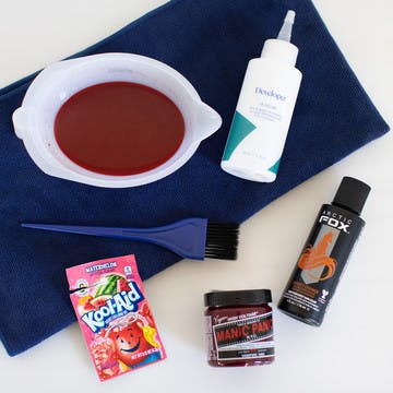 Image of eSalon's custom home hair color in a white mixing bowl next to developer with tint brush below it and examples of semi-permanent hair color