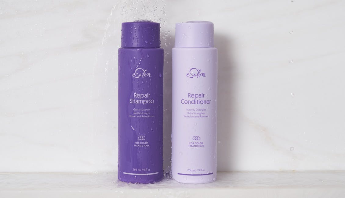Bottles of eSalon Repair shampoo and conditioner.