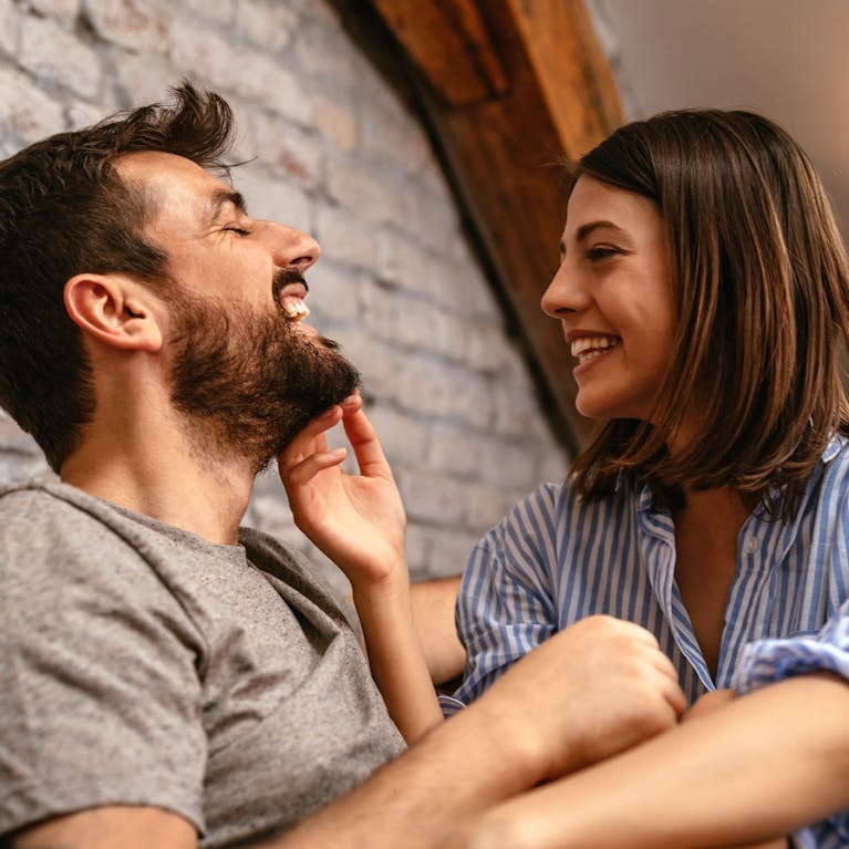 Woman talking to her husband about dyeing his beard and hair with Colorsmith custom home hair color