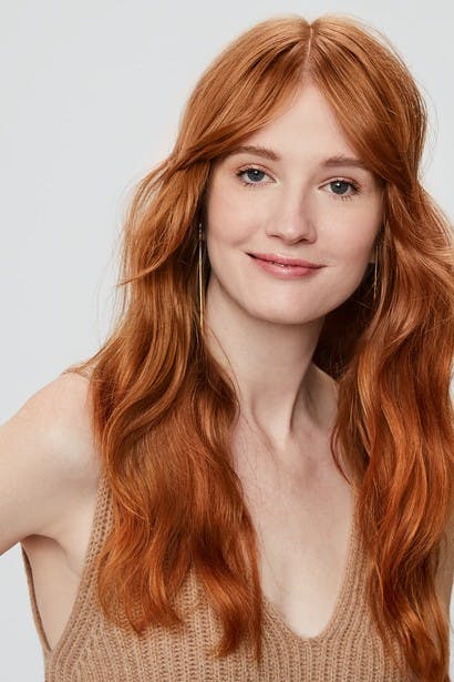 Image of esalon client dominique's custom dark blonde copper hair color