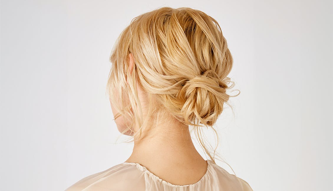 Woman with Champagne Fizz hair. 