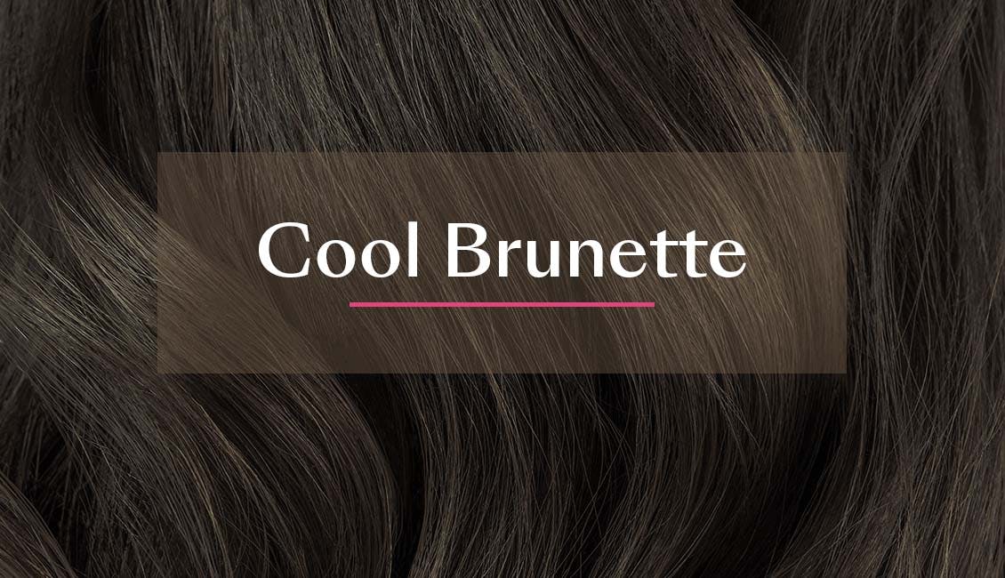 Cool brunette hair with a slight curl.
