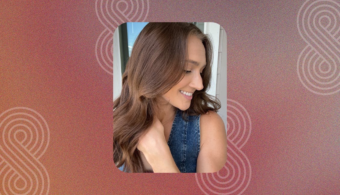Woman showcasing the Chocolate Go-Getter hair color trend.