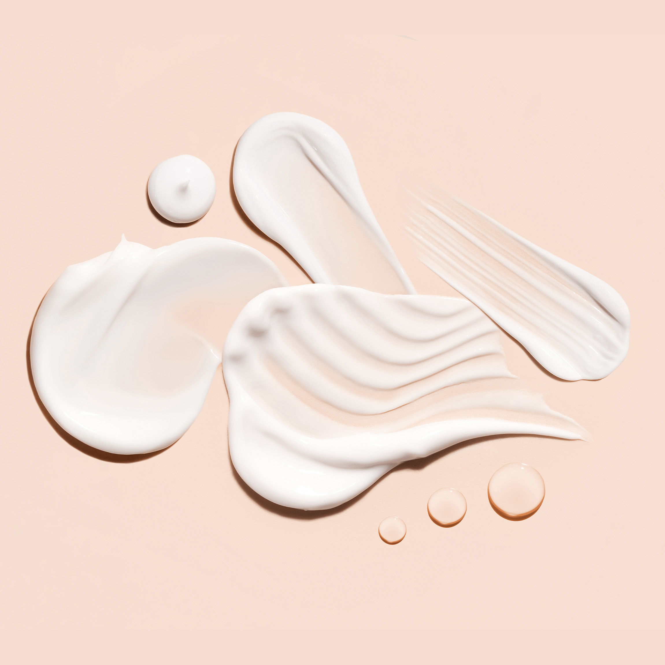 Swipe of different product formulas showing their texture. 