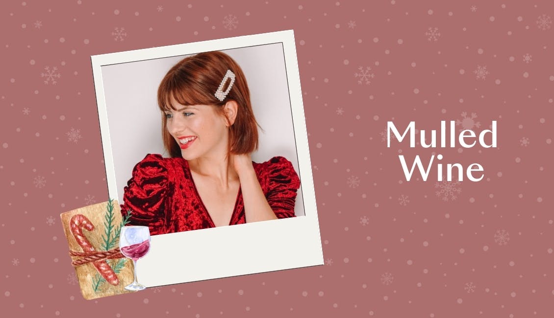 Woman with Mulled Wine red hair with a festive present next to her.