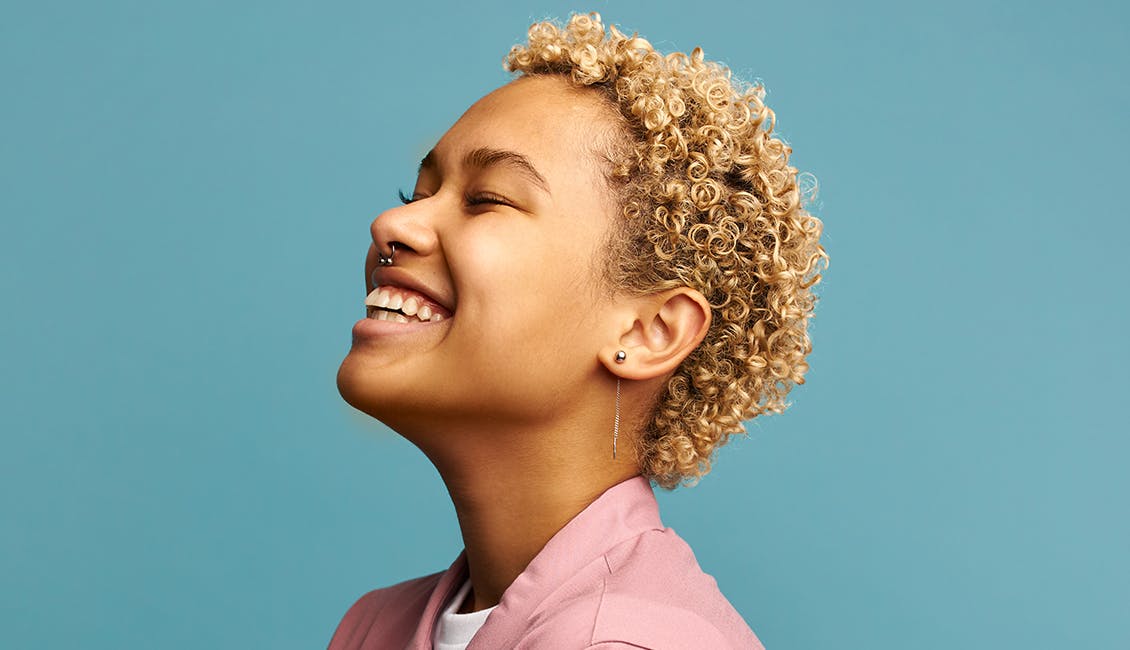 Woman with Butterscotch Blonde hair. 