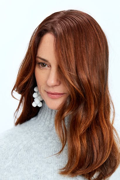 Image of esalon client Sharon with custom light brown copper golden hair color