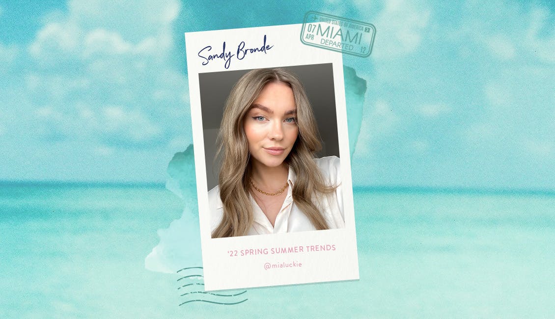 The lovely Mia shows off our third 2022 Spring and Summer hair color trend, Sandy Bronde. This custom hair color shade is our beachy version of the ever-so-chic mix of blonde and brunette colors trending right now. 