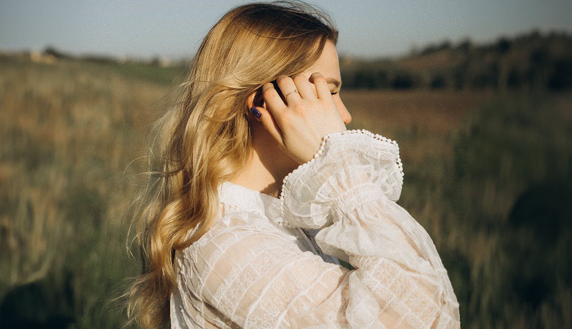 Woman with Sunflower Blonde hair.