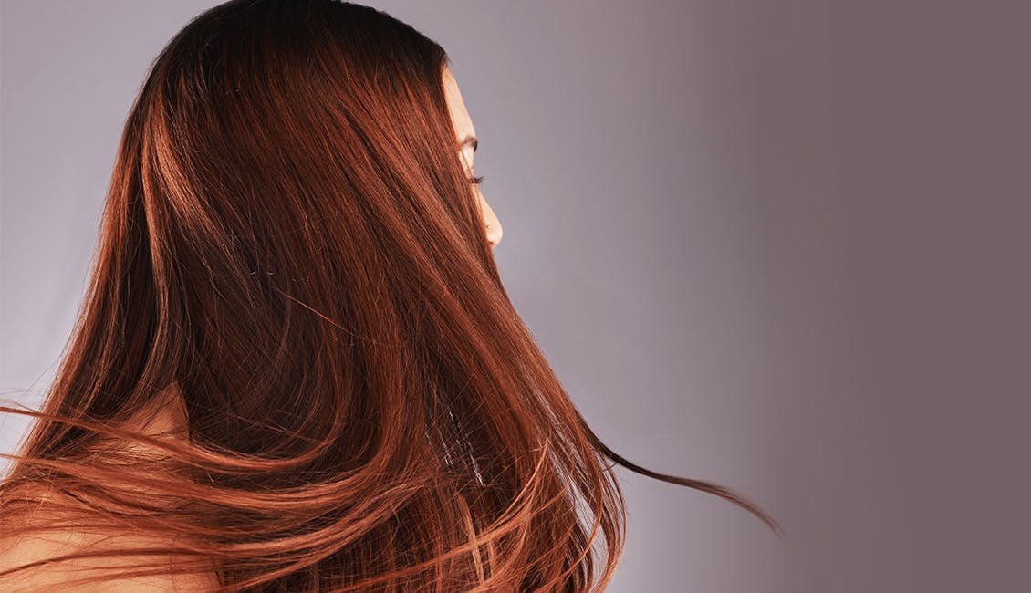 Woman with Ravishing Copper Red hair. 