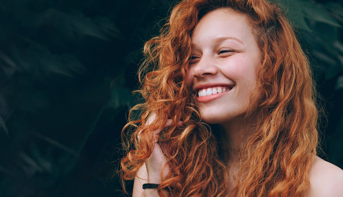 Woman with Royal Copper Spice hair. 